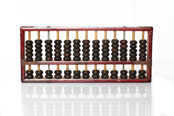 Old wooden abacus on white background