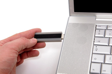 Men connecting flash drive