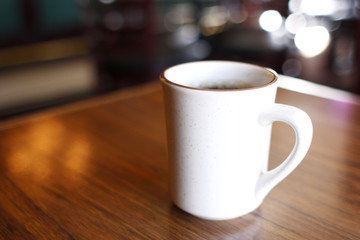 Coffee mug on table at a restaurant bar