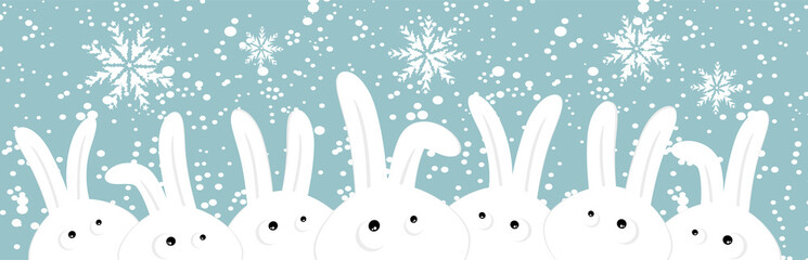 Rabbits on christmas winter background