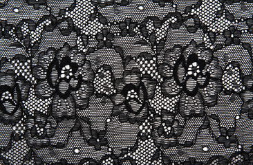 Background from black lace with pattern with form flower