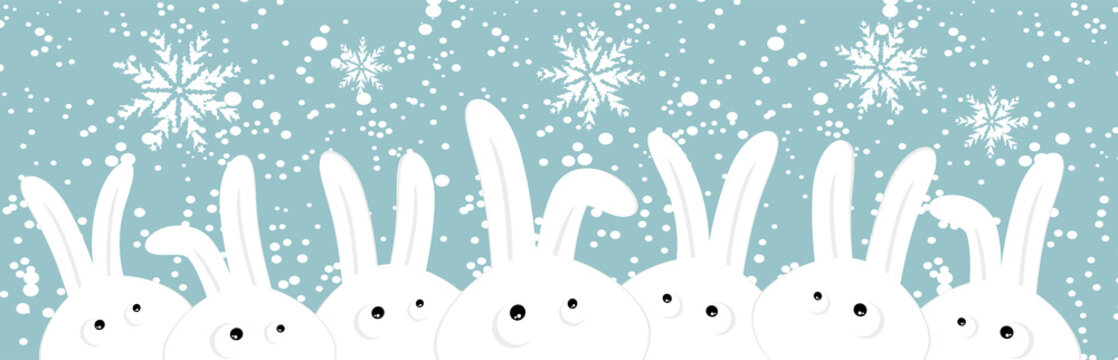 Rabbits on christmas winter background