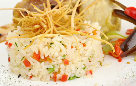 Vegetable risotto with fried thin potatosticks