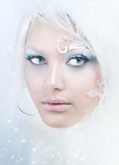 Beautiful Girl's Face.Creative Winter Makeup