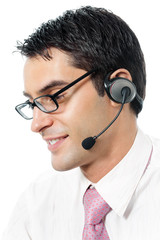 Support phone operator in headset at workplace, isolated