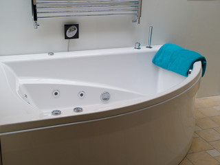 Bathtub jacuzzi in a modern trendy batroom