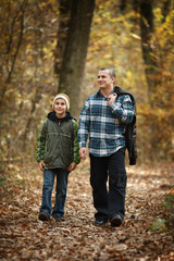 Fototapeta premium Father and son taking a walk outdoor