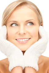 beautiful woman in white mittens