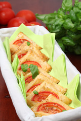 Puff pastry with cheese and tomatoes