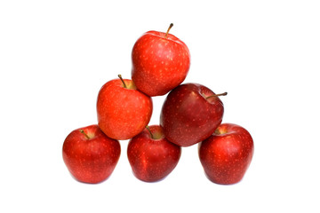 Red apples in the form of a pyramid isolated on a white backgrou