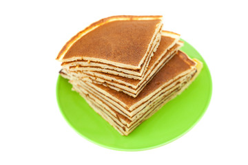 Pancakes on a plate isolated on white