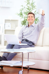 Obraz premium Man with laptop