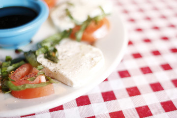 Mozzarella Caprese on a dining table at a restaurant