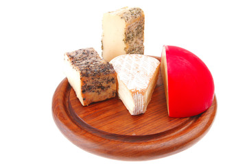 aged cheeses on wood
