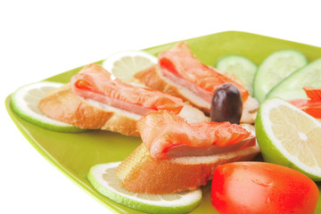 sandwich with salmon on green