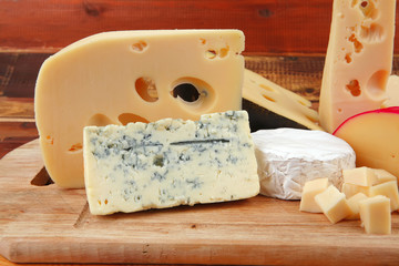 cheeses on cutting board