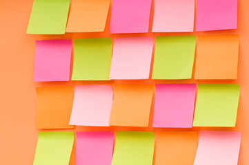 Reminder notes on the bright colorful paper