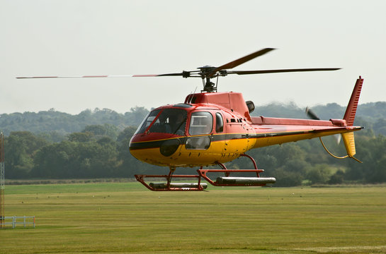 AS.350 helicopter hovers before landing