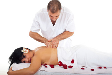 Obraz na płótnie Canvas Professional masseur giving woman massage
