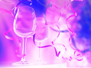 Champagne in glasses and ribbons on celebration