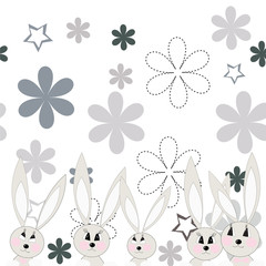 Gray rabbits on a flower glade