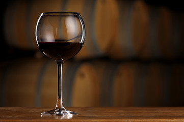 Glass of wine in wine cellar