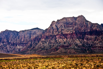 Colorful Red Rock Mountains Across Desert