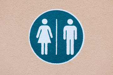 Indication peinte de toilettes homme et femme