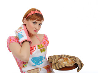 Beautiful cooking woman in apron and homemade bread
