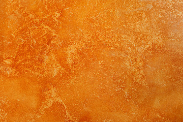 Orange grungy wall background