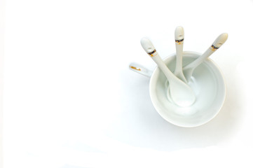 isolated mug and spoon on a white background