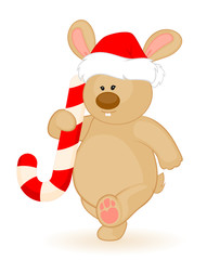 cartoon little toy bunny in the cap of Santa Claus