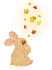 Vector cartoon little toy bunny with autumnal leaves