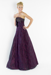 Fototapeta premium woman wearing formal dress with champagne