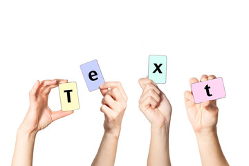 Four hands holding blank cards with copy space