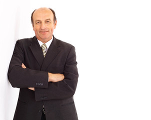 Portrait of a handsome young man in a business suit