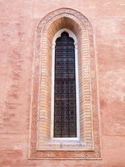 Fototapeta na wymiar Old window on the Venetian house