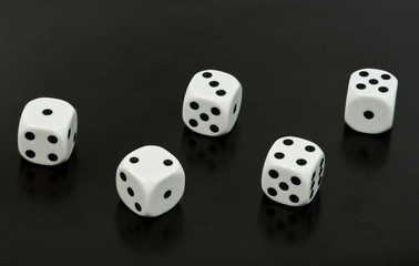 dices compose small row over black