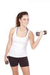 Woman white tank lifting weight