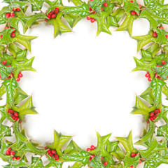 Christmas framework with holly berry isolated