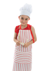 Smiling chef holding kitchen utensils