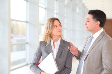 Business partners meeting in modern building