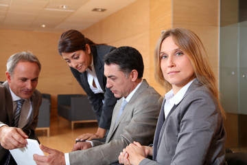 Group of associates meeting in lounge