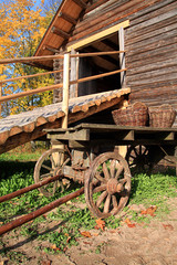 wooden cart near old building