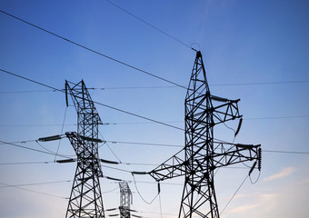 Electricity pylons and lines.