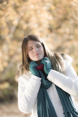 Winter fashion - woman in park