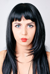 Young woman with red lips.