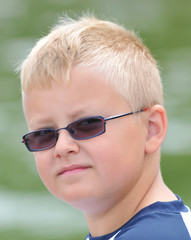 Juvenile Boy with Sunglasses