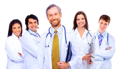 Portrait of group of smiling hospital colleagues standing