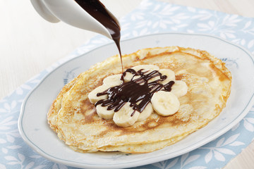 Crepes with banana and chocolate